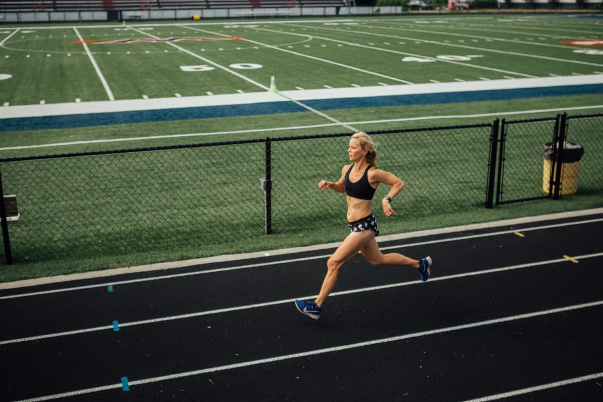 mother runner running on track.