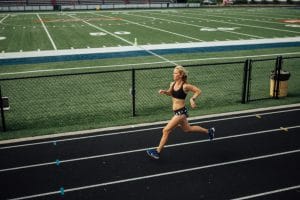 mother runner running on track.