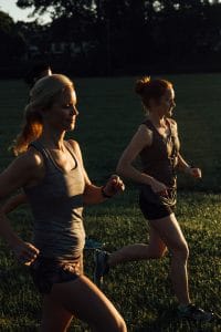 Rebecca Weinand running with Whitney Heins at dawn