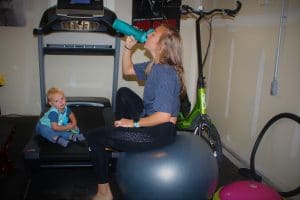 Neely trains at home with her son. 