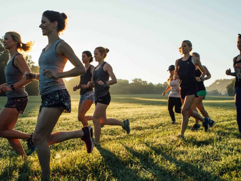 women running in field