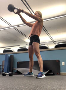 Whitney Heins doing kettle bell swing