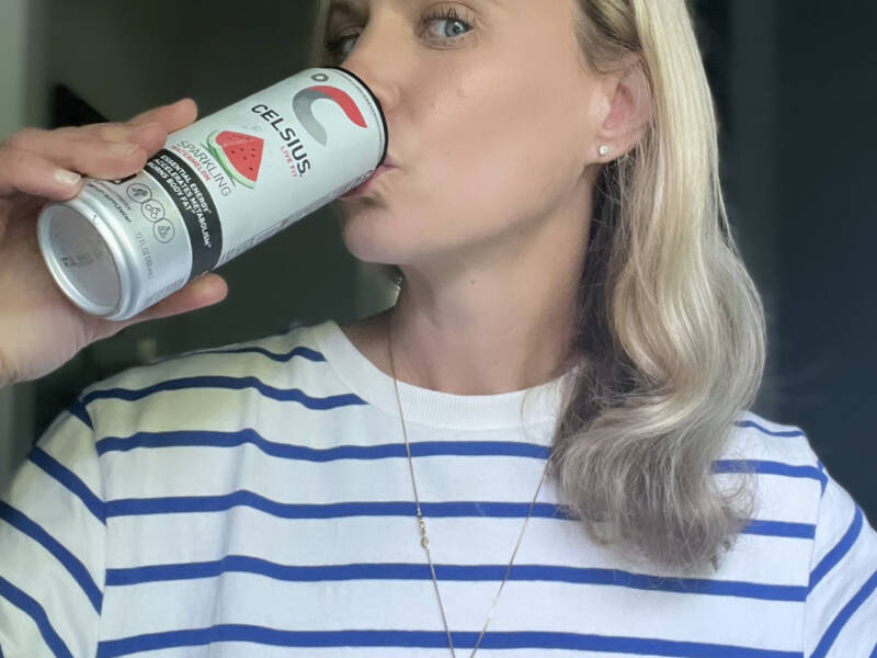 Whitney Heins drinking Celsius drink
