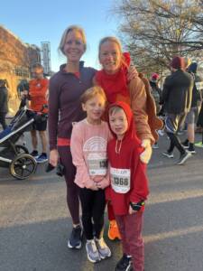 Whitney Heins with friends and kids at turkey trot