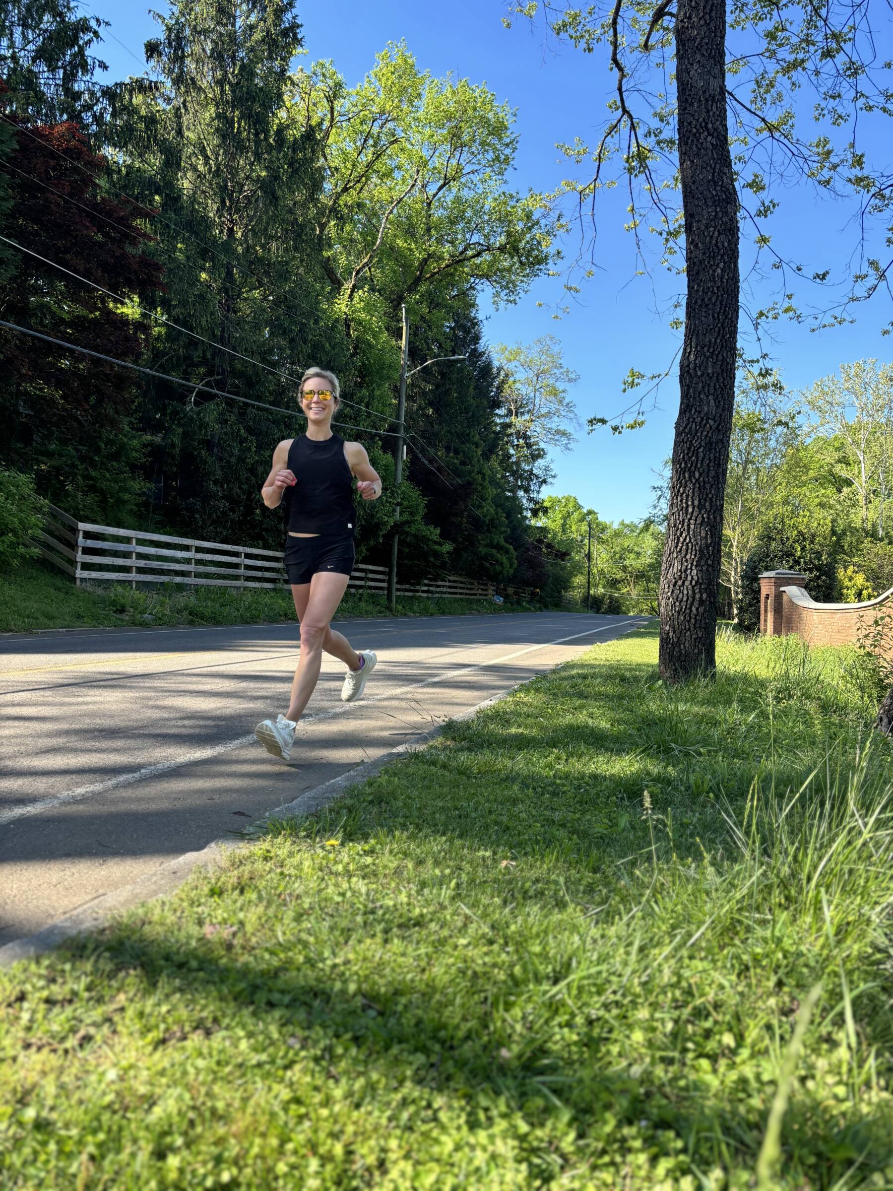 whitney running on a path wearing black