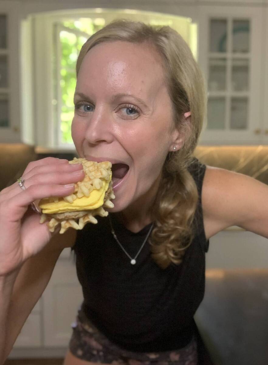 whitney eating a sandwich