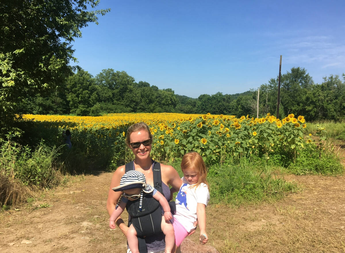 whitney carrying her two kids